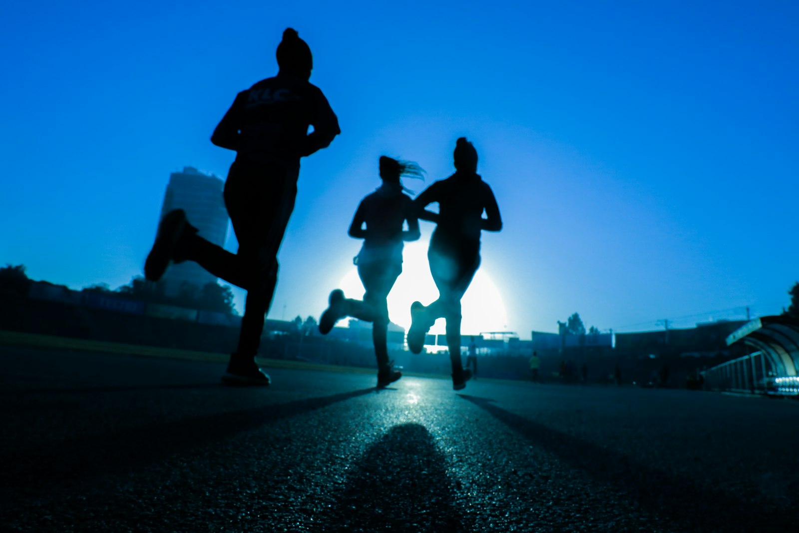 Runners training at dusk